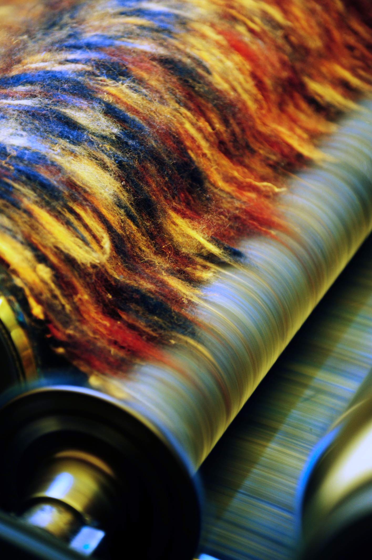 3--Carding - raw materials fed to drums of carding machine